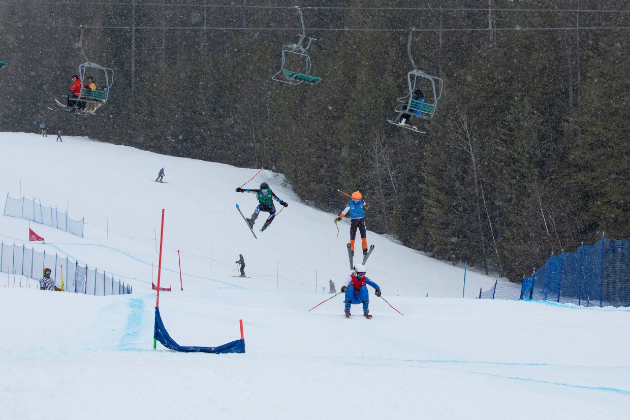 Ski Cross racers nearing the finish line
