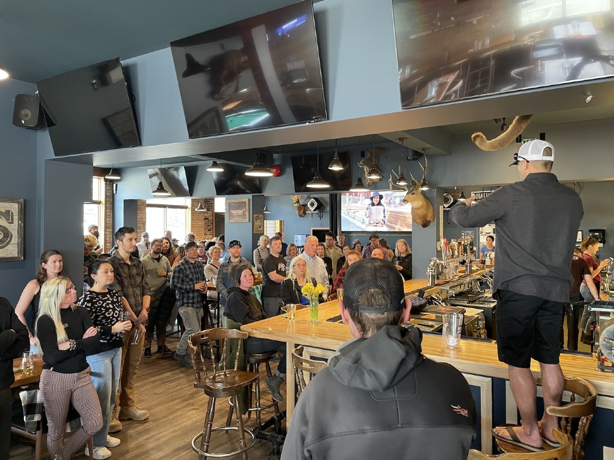 Tunnel49 Co-Owner Jon Levesque speaking at social event