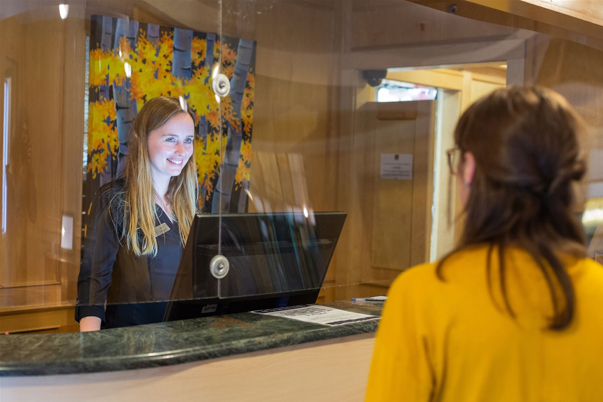 Safety is top of mind at Park Place Lodge - Plexiglass at the Front Desk