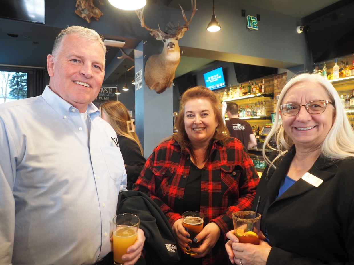 Representatives from Rotary Club, City of Fernie Council and College of the Rockies at the social event