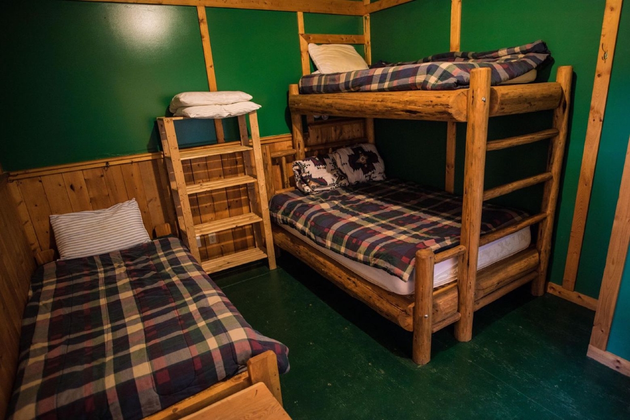 Handmade log beds for a cosy night's sleep