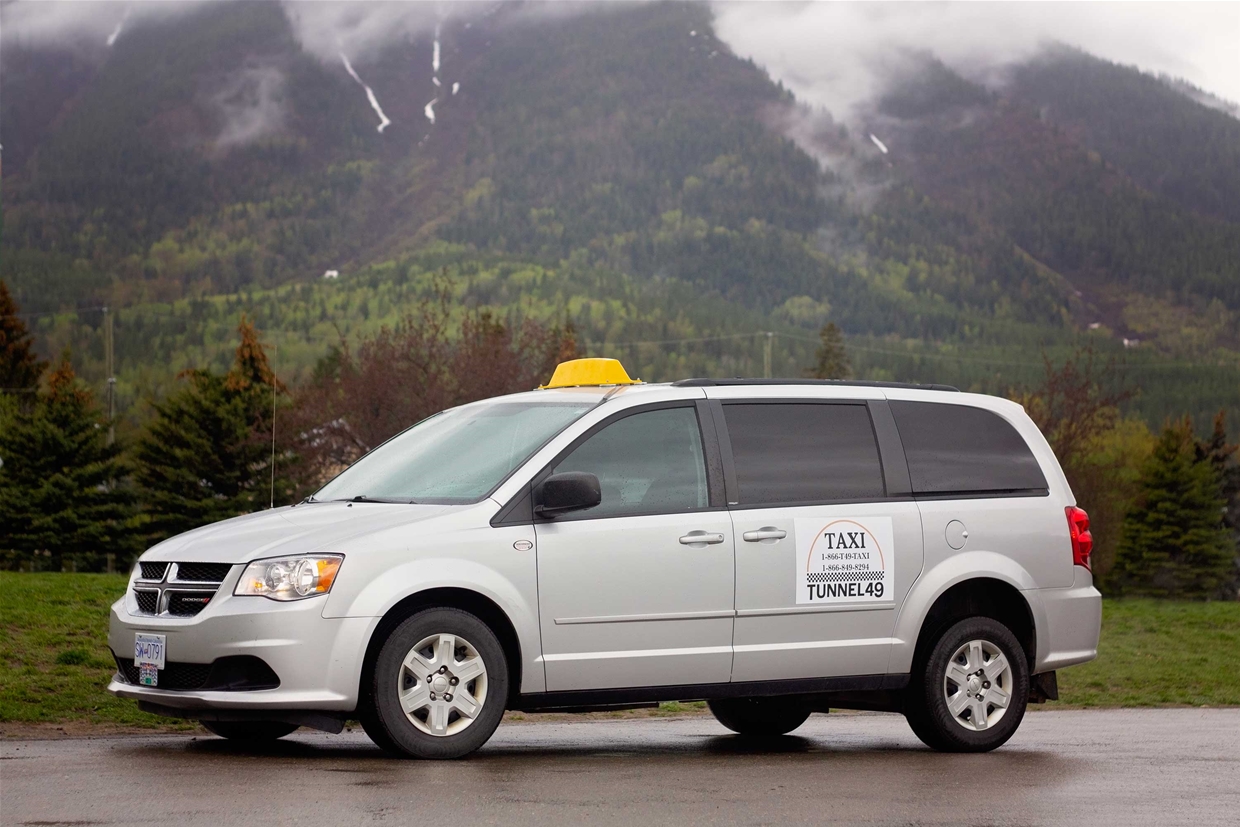 Wheelchair accessible taxi has the capacity for 3 passengers and a wheelchair.