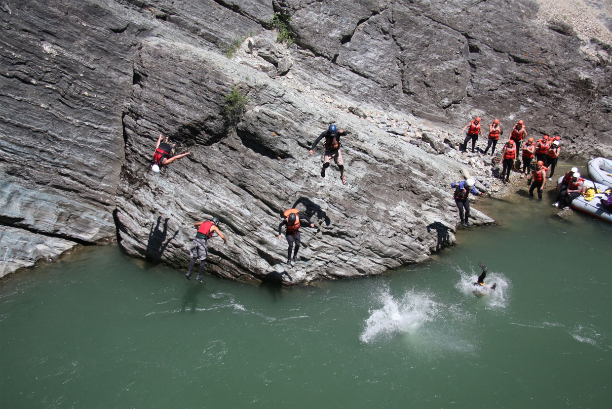 Cliff jumping in the canyon 