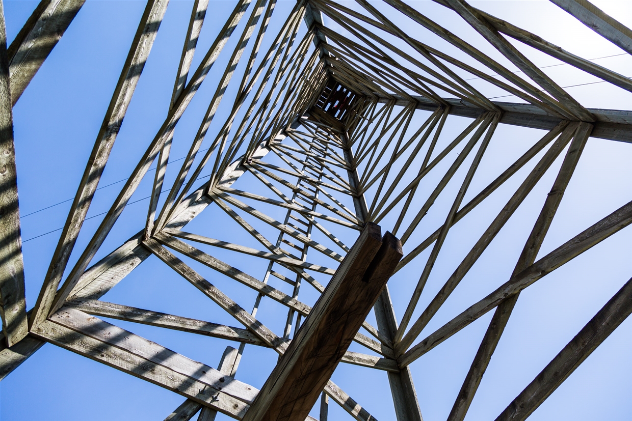 Under the oil derrick